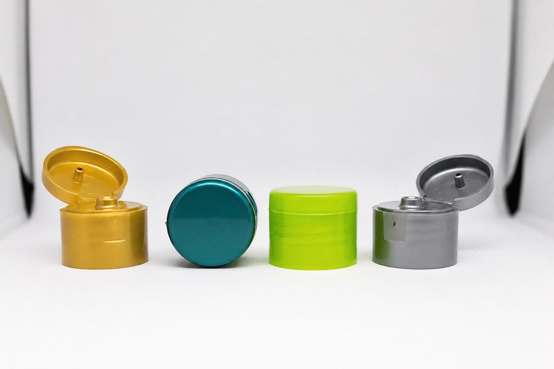 Flip top caps for pharma and cosmetics